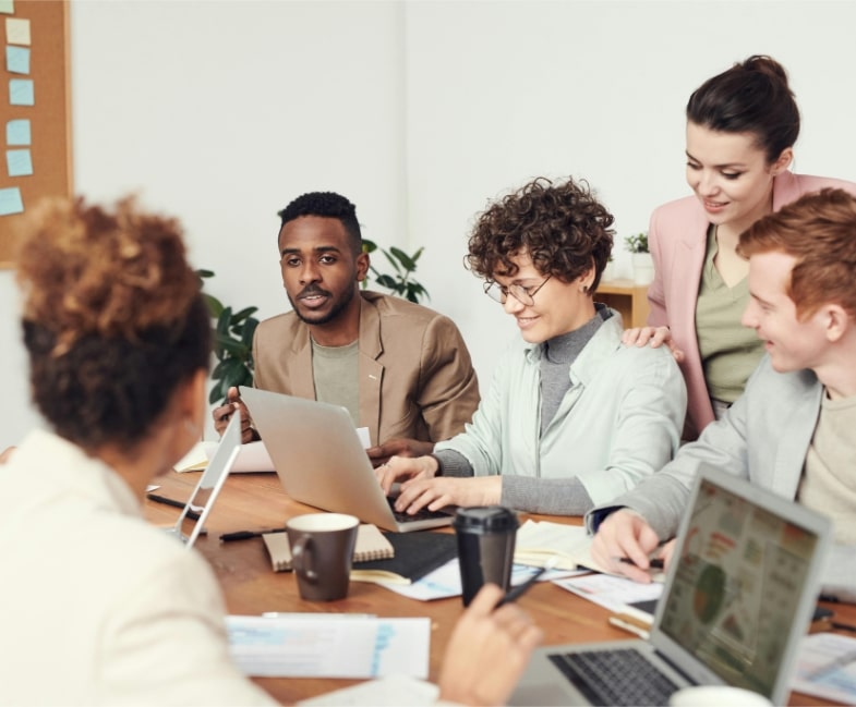 A group of people at a work meeting.